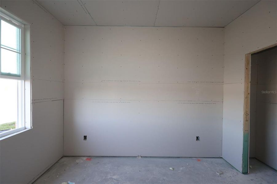 In-progress construction of a new home in Center Lake on the Park, St. Cloud, FL (Image 7).