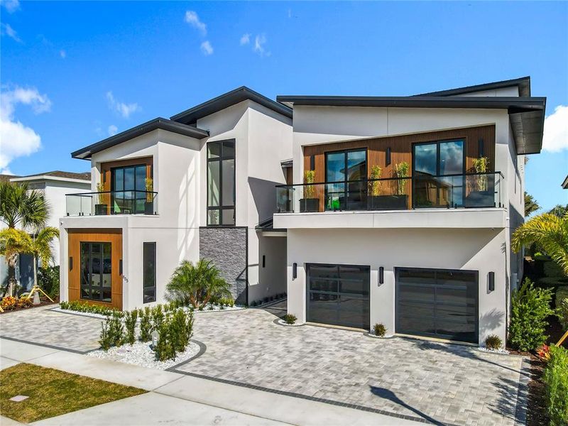 Front exterior of a new home in , Reunion, FL, highlighting curb appeal (Image 23). Front exterior of a new home in , Reunion, FL, highlighting curb appeal (Image 23).