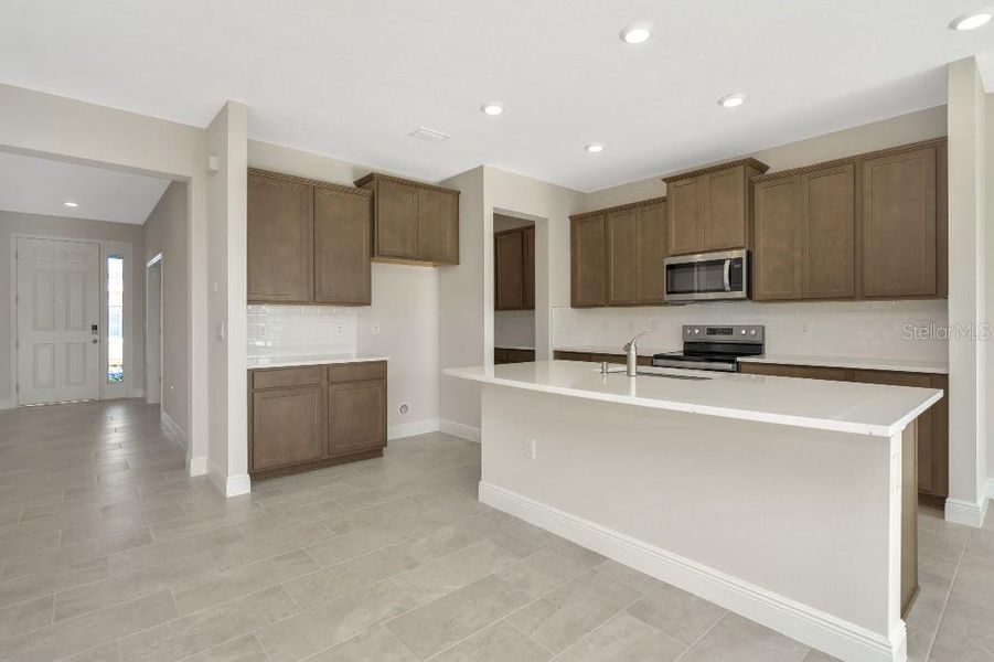 Furnished interior view inside a new home in Mangrove Manor, Apollo Beach (Image 13).
