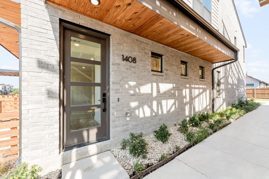 Exterior details and patio area of a home in Willow Grove Townhomes, Melissa (Image 29).