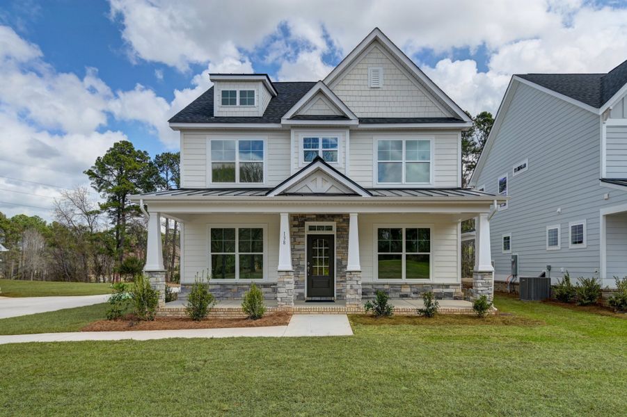 Front exterior of a new home in Clubside Reserve at Summerlake, Lexington, SC, highlighting curb appeal (Image 1). Front exterior of a new home in Clubside Reserve at Summerlake, Lexington, SC, highlighting curb appeal (Image 1).