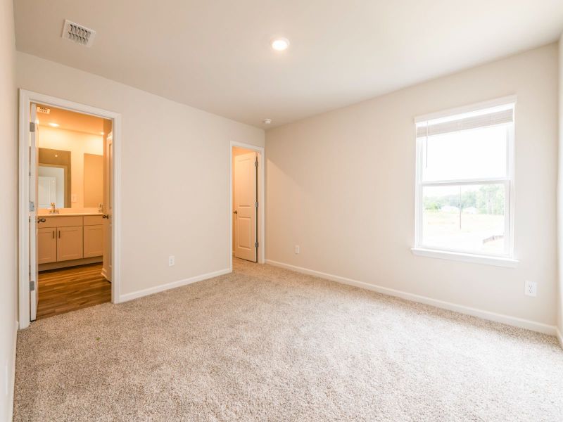 Two secondary bedrooms round out the upstairs.