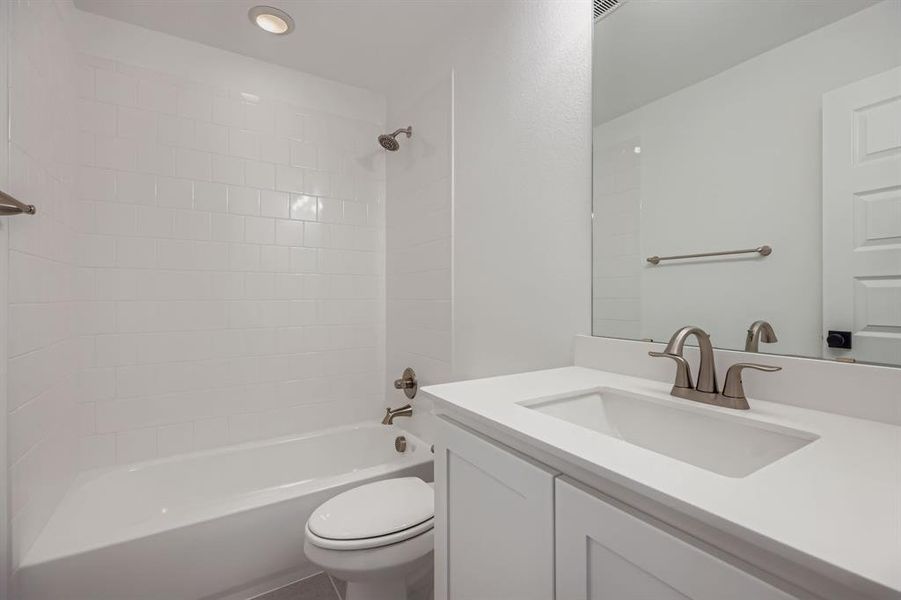 Full bathroom with vanity and shower / washtub combination