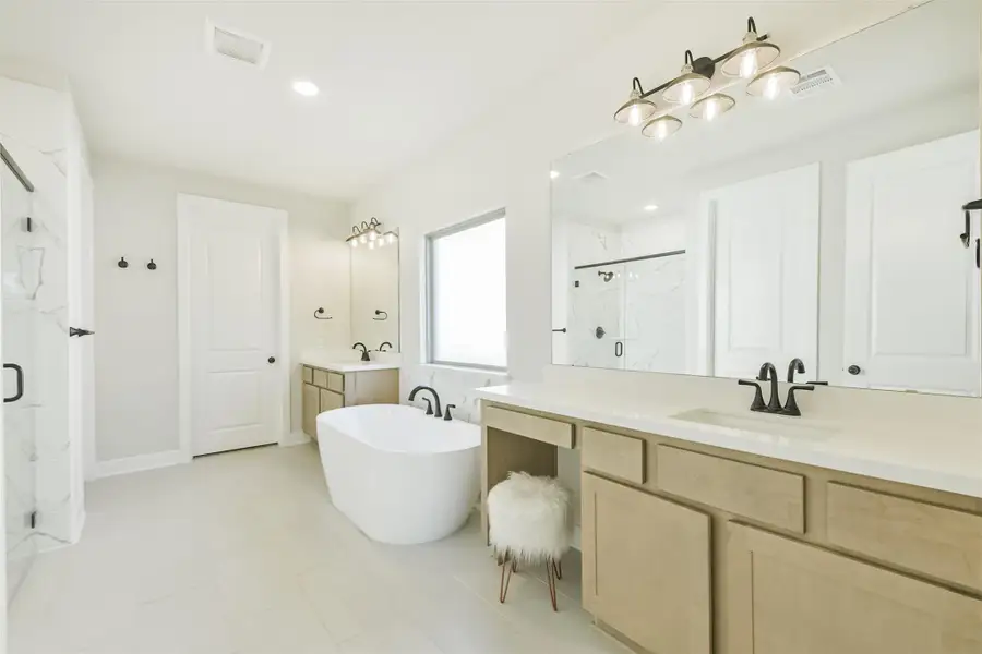 Furnished interior view inside a new home in The Woodlands Hills – 55', Willis (Image 3).