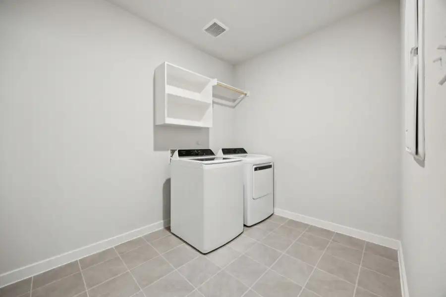 Utility Room in the Heisman home plan by Trophy Signature Homes – REPRESENTATIVE PHOTO
