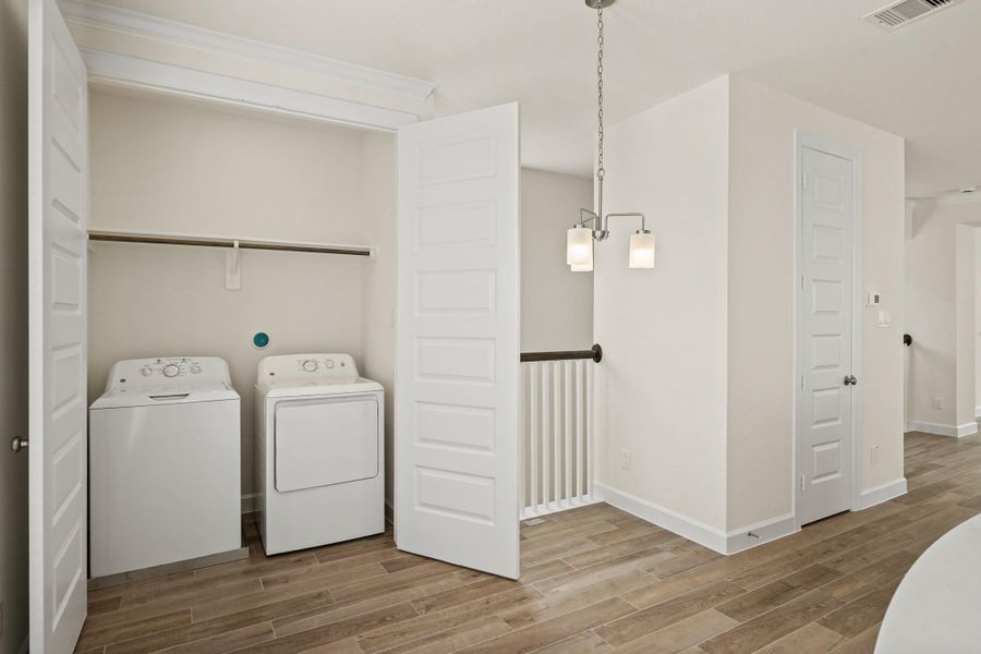 Cozy dining area and laundry room (*Photo not of actual home and used for illustration purposes only.)
