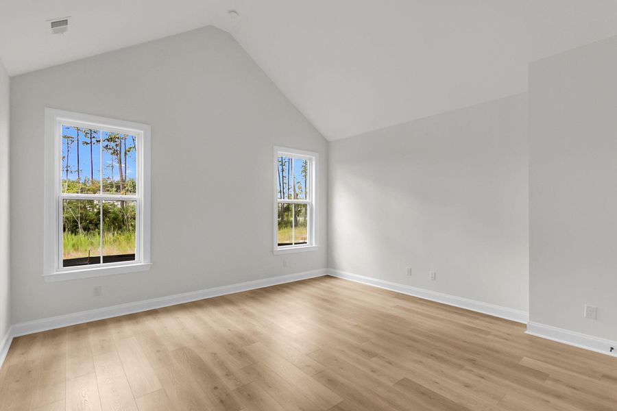 Spacious, unfurnished interior of a new home in Tidewater at Lakes of Cane Bay, Summerville (Image 40).