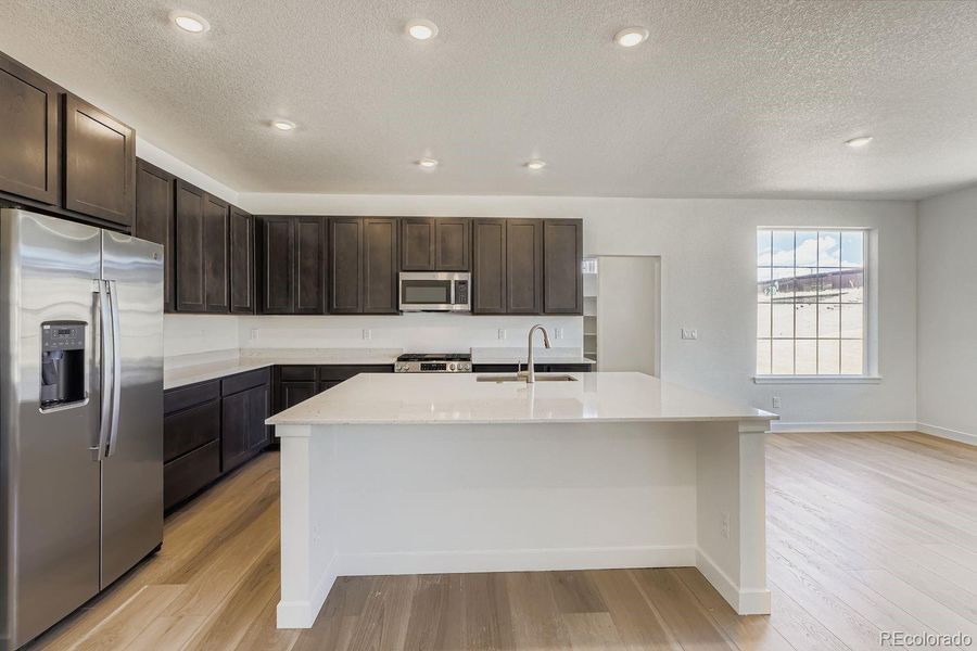 Furnished interior view inside a new home in Newlin Crossing: The Monarch Collection, Parker (Image 4). Furnished interior view inside a new home in Newlin Crossing: The Monarch Collection, Parker (Image 4).
