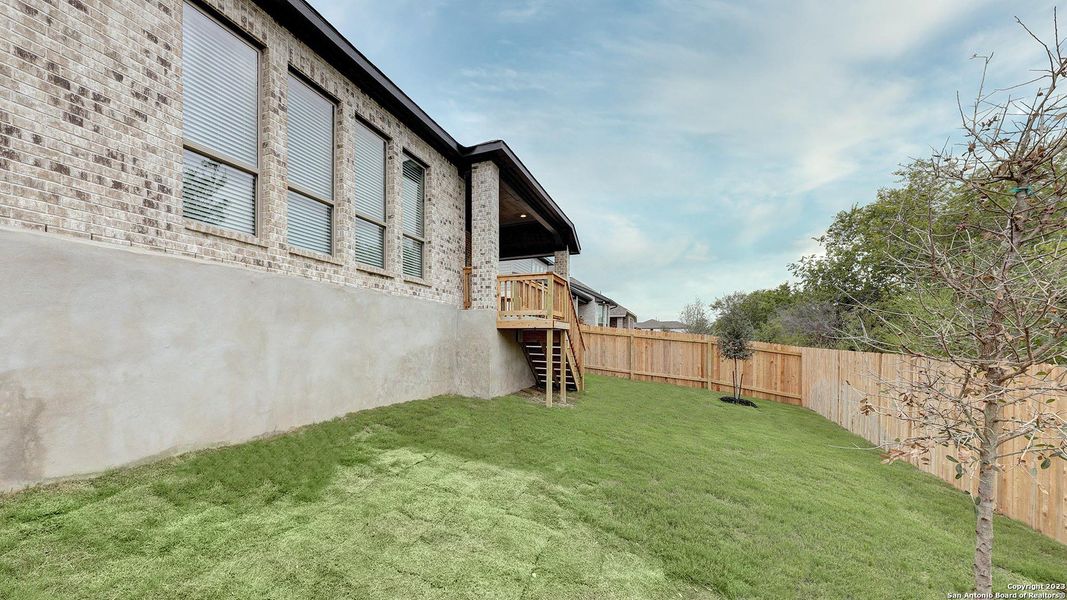 Front exterior of a new home in Weston Oaks 55', San Antonio, TX, highlighting curb appeal (Image 18). Front exterior of a new home in Weston Oaks 55', San Antonio, TX, highlighting curb appeal (Image 18).