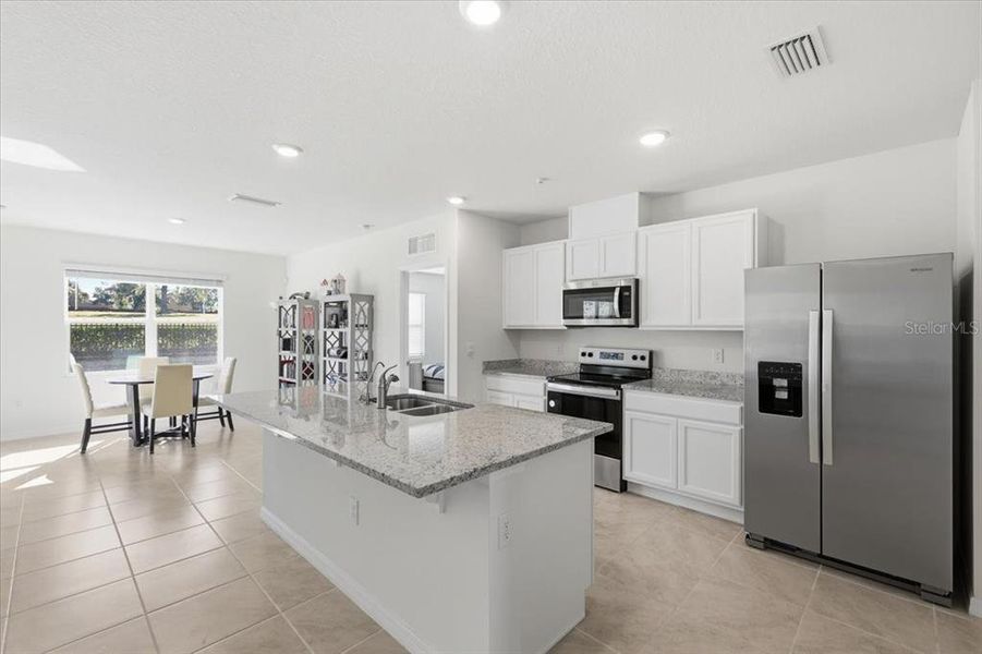 Furnished interior view inside a new home in Oak Pointe, Apopka (Image 8). Furnished interior view inside a new home in Oak Pointe, Apopka (Image 8).