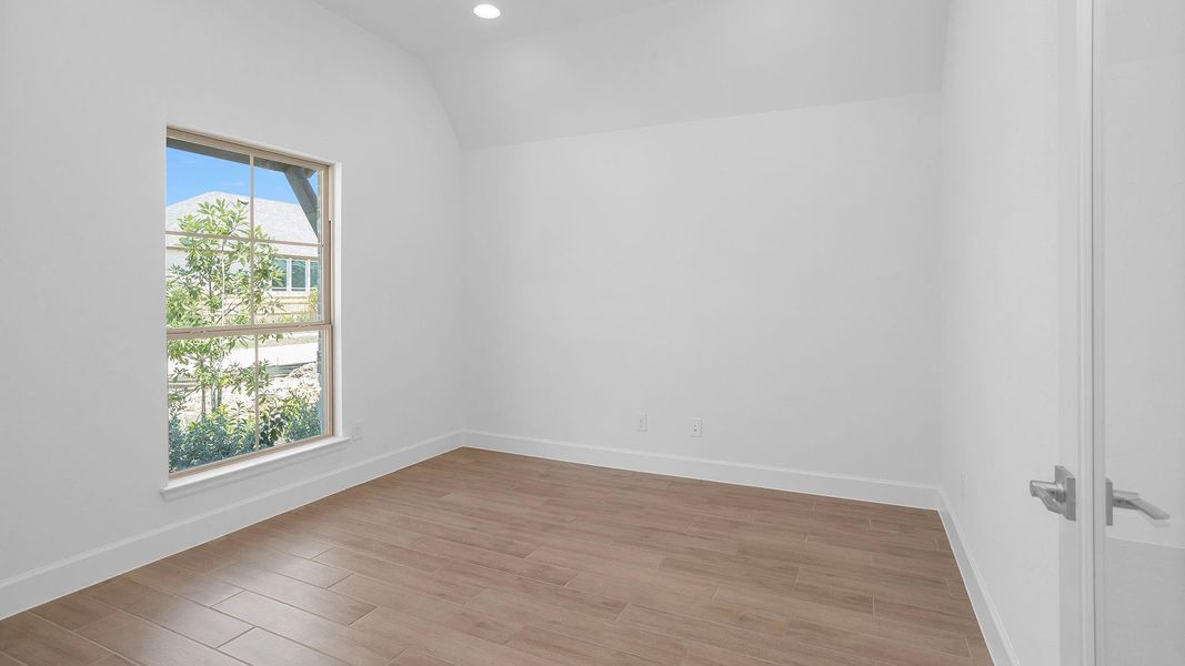 Spacious, unfurnished interior of a new home in Artavia 50', Conroe (Image 13).