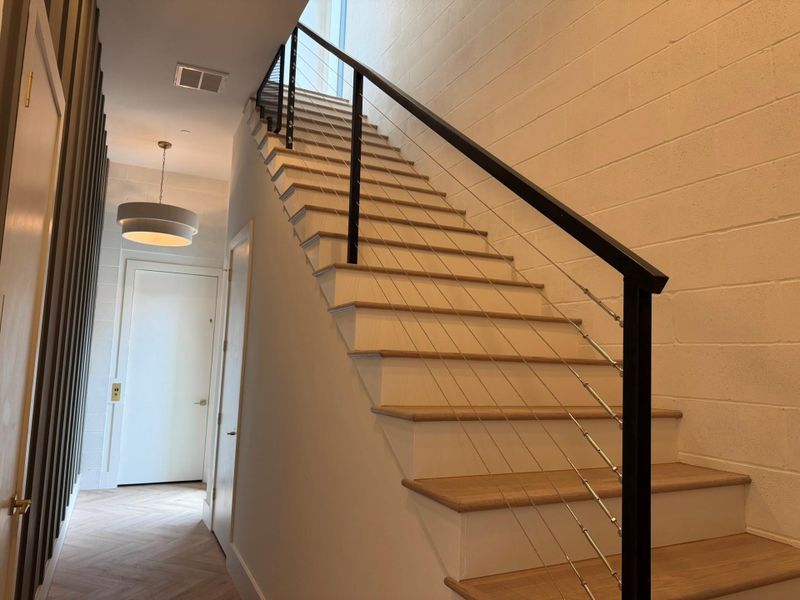 1 st FLOOR view of Gated Entry and Elevator. Door leads to Floor SEALED Garage and under stairs EXTRA STORAGE