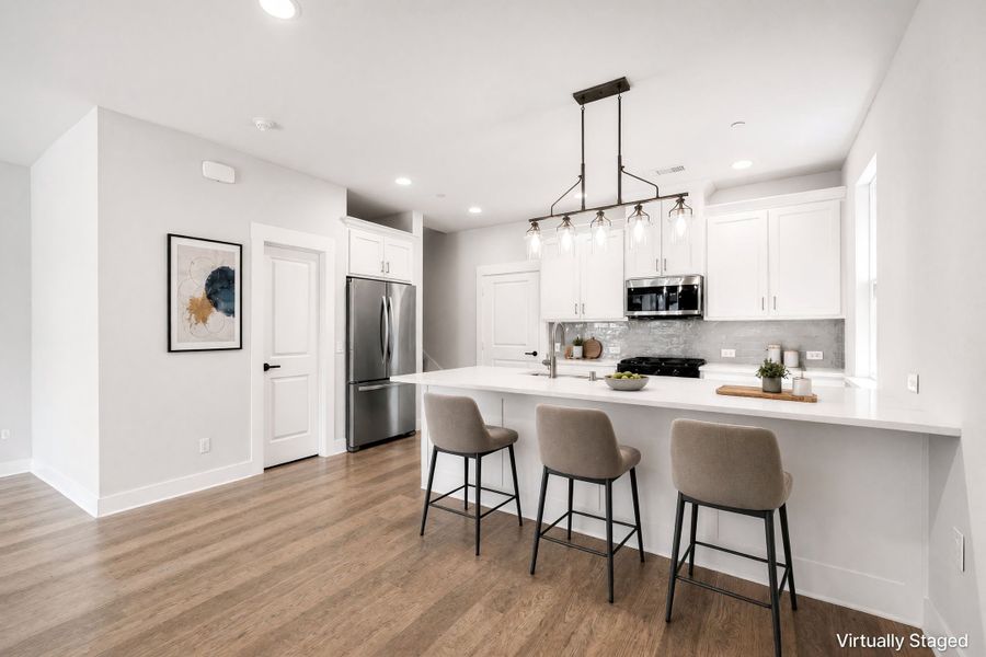 Furnished interior view inside a new home in Willow Grove Townhomes, Melissa (Image 8).
