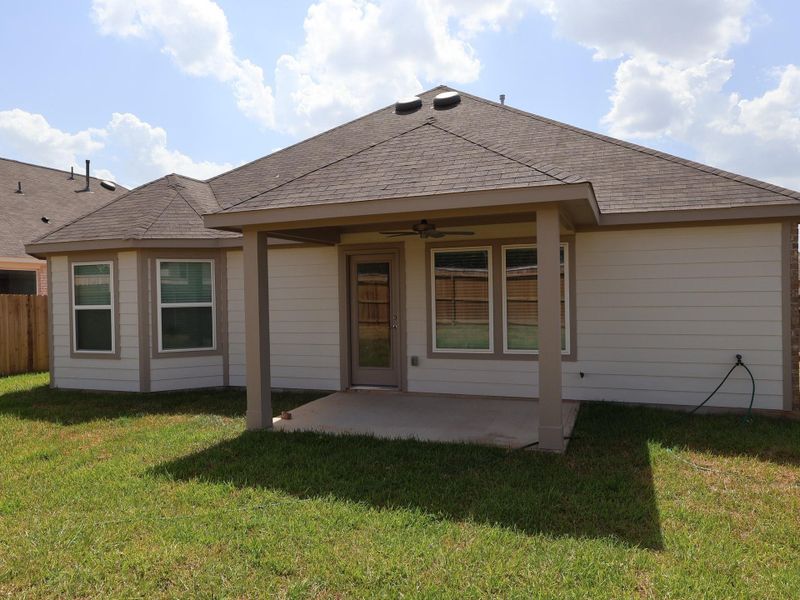 Exterior details and patio area of a home in Magnolia Ridge, Magnolia (Image 4).