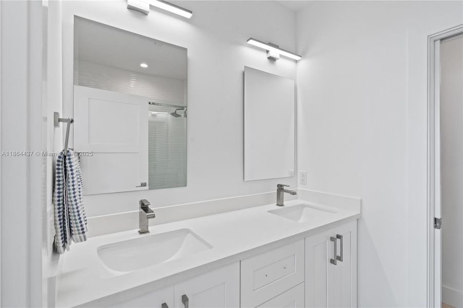 Furnished interior view inside a new home in , Islamorada, Village of Islands (Image 32).