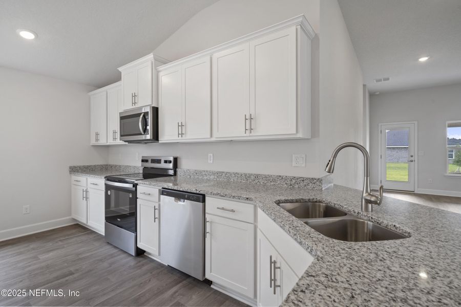Furnished interior view inside a new home in Shadow Crest at Rolling Hills, Green Cove Springs (Image 5).