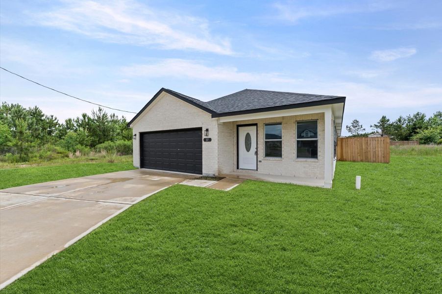 Front exterior of a new home in , Cleveland, TX, highlighting curb appeal (Image 18). Front exterior of a new home in , Cleveland, TX, highlighting curb appeal (Image 18).
