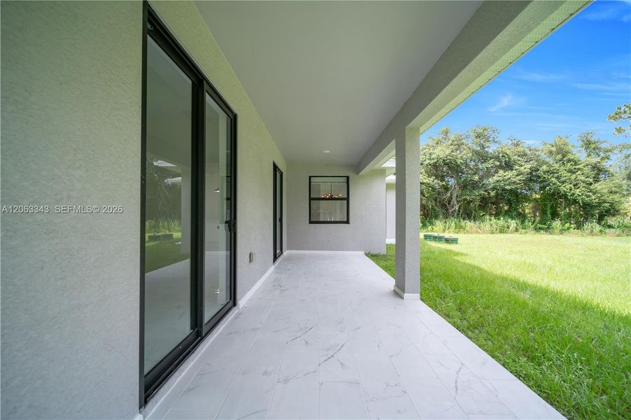Exterior details and patio area of a home in , Lehigh Acres (Image 25). Exterior details and patio area of a home in , Lehigh Acres (Image 25).