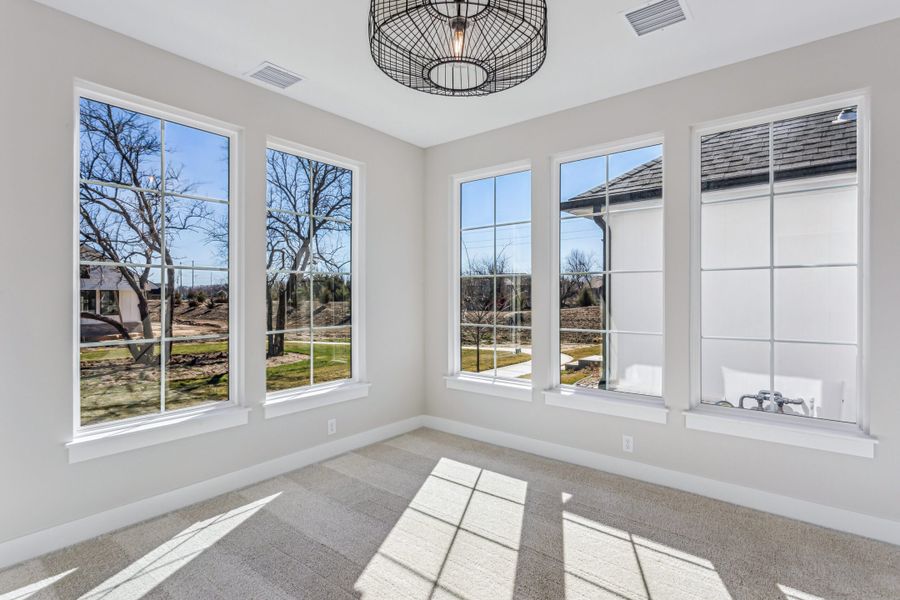 Spacious, unfurnished interior of a new home in The Courtyards at Jacobs Farm, Wichita (Image 12).