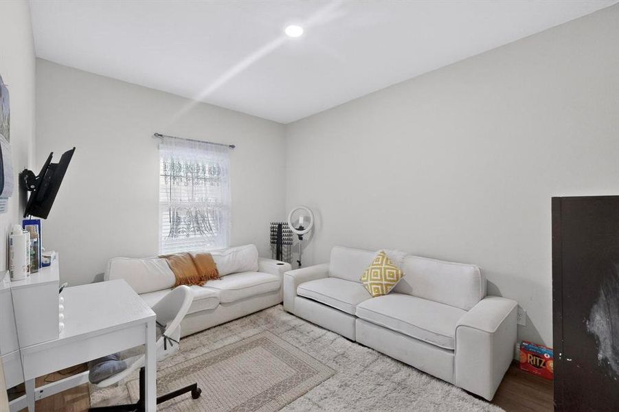 Home office with wood finished floors Home office with wood finished floors