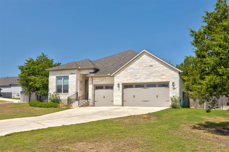Front exterior of a new home in , Bastrop, TX, highlighting curb appeal (Image 19). Front exterior of a new home in , Bastrop, TX, highlighting curb appeal (Image 19).