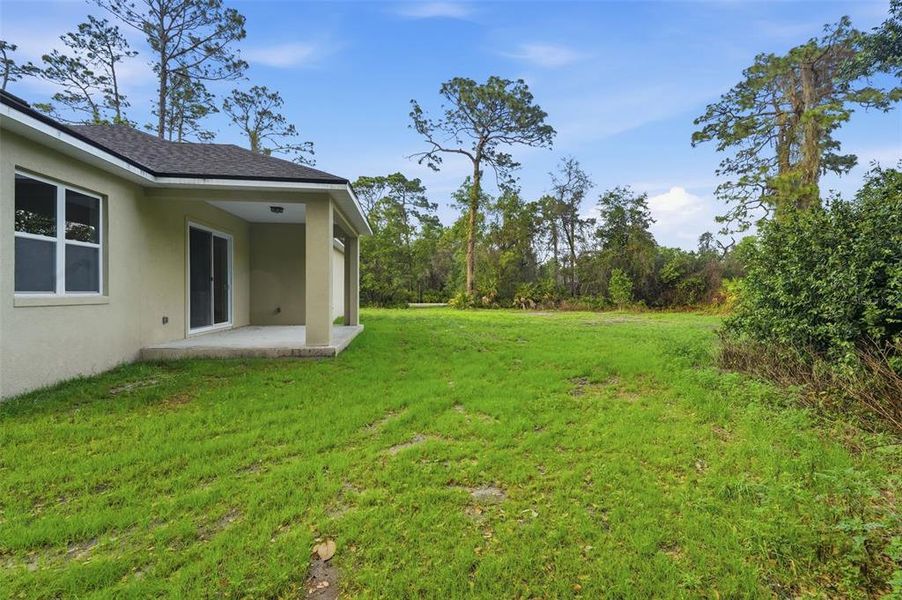 Exterior details and patio area of a home in , Debary (Image 16).