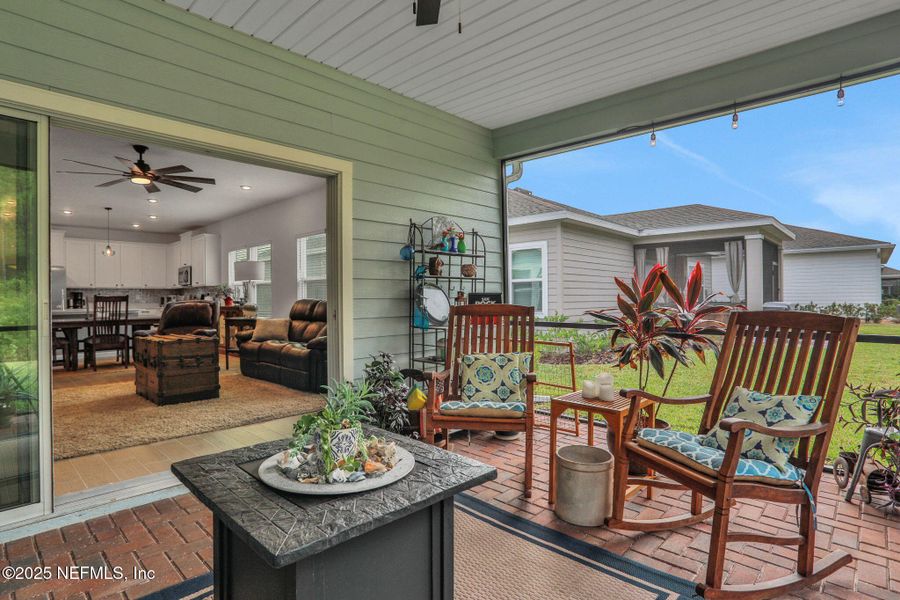 Exterior details and patio area of a home in Tributary: Lakeview at Tributary 50's, Yulee (Image 20).