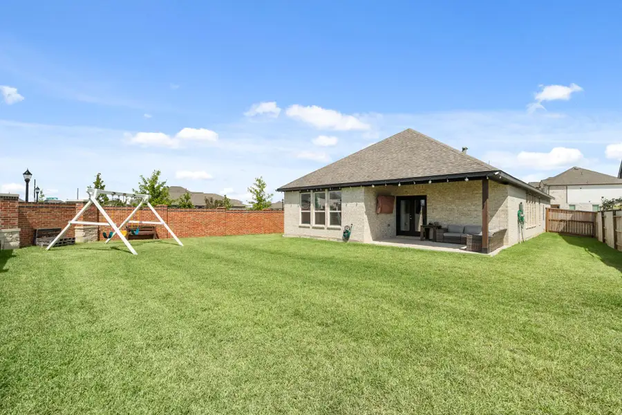 Enjoy the outdoors in this spacious and low-maintenance backyard! With plenty of room for play, gardening, or relaxing, this private outdoor space is the perfect blank canvas to make your own.