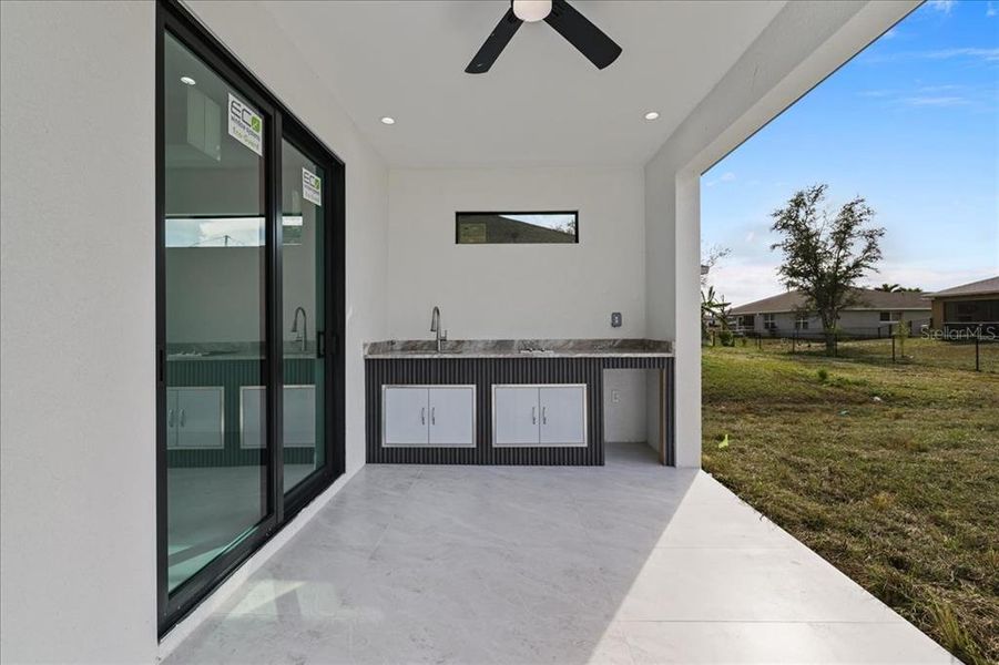 Exterior details and patio area of a home in , Cape Coral (Image 28).