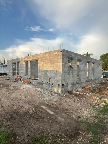 Front exterior of a new home in , Florida City, FL, highlighting curb appeal (Image 12).