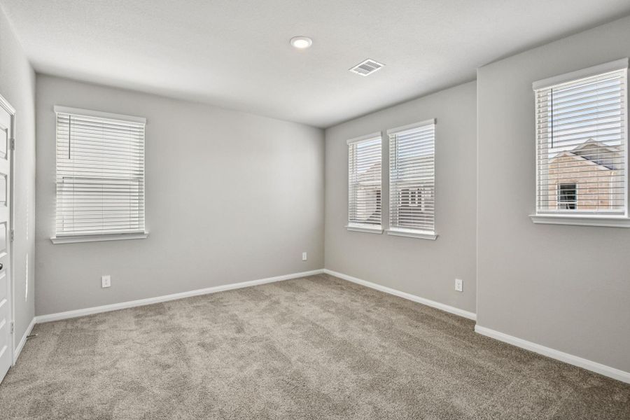 Spacious, unfurnished interior of a new home in Spring Brook Village - Luxe Series, Houston (Image 26).