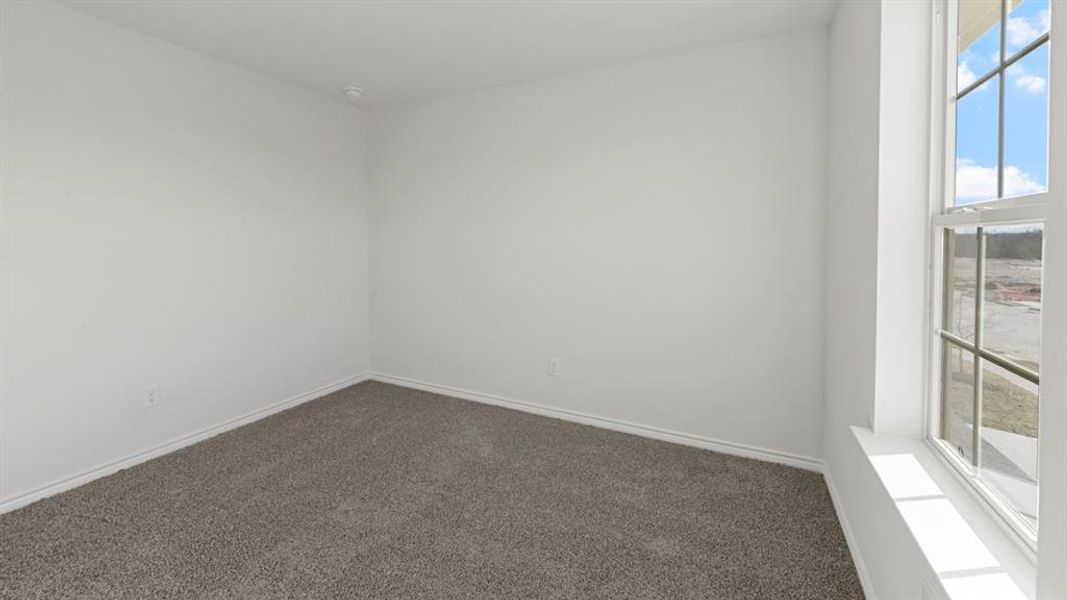 Room featuring light gray carpeting, white walls, and a recessed ceiling light Room featuring light gray carpeting, white walls, and a recessed ceiling light