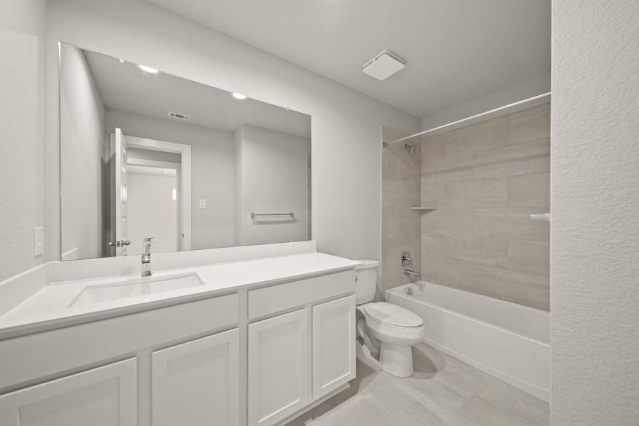 Furnished interior view inside a new home in Cypresswood Landing, Humble (Image 5).