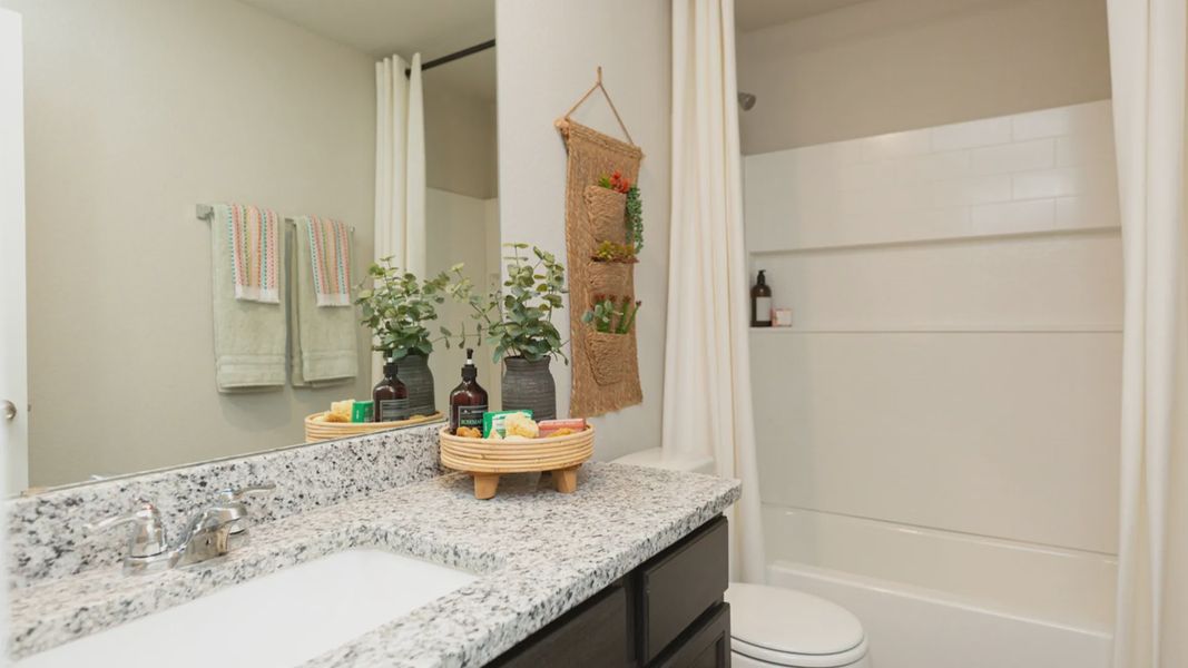 Representative furnished interior of a home built from the The Woodland by Legend Homes in Granger Pines, Conroe (Image 16).