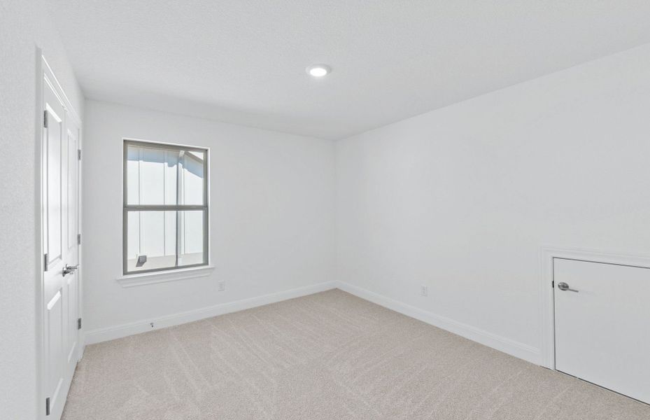 Spacious, unfurnished interior of a new home in Saddleback at Santa Rita Ranch, Liberty Hill (Image 42).