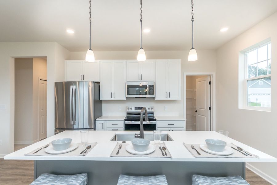 Furnished interior view inside a new home in Mystic Ridge, Whitmore Lake (Image 41).