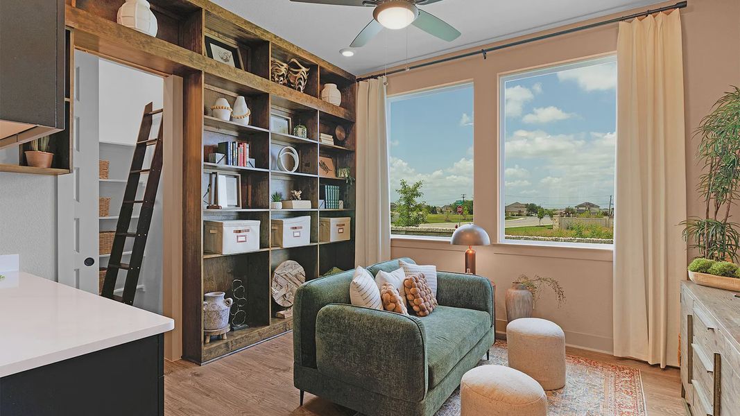 Representative furnished interior of a home built from the Silas by Chesmar Homes in Crescent Bluff, Georgetown (Image 11).