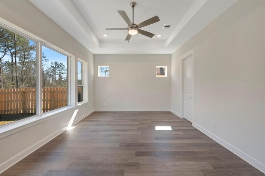 Another view of this master suite with lots of windows for light!