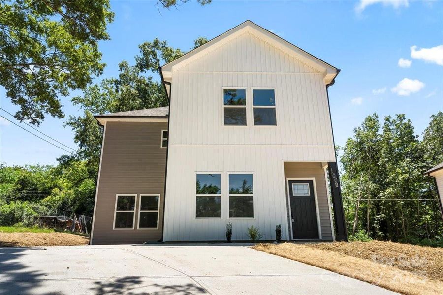 Front exterior of a new home in , Albemarle, NC, highlighting curb appeal (Image 15).