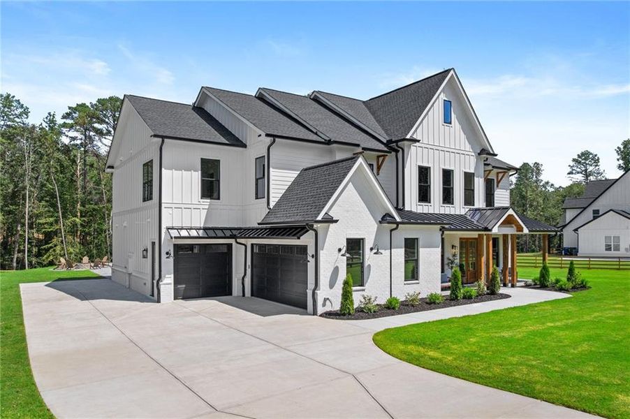 Front exterior of a new home in , Dacula, GA, highlighting curb appeal (Image 28).