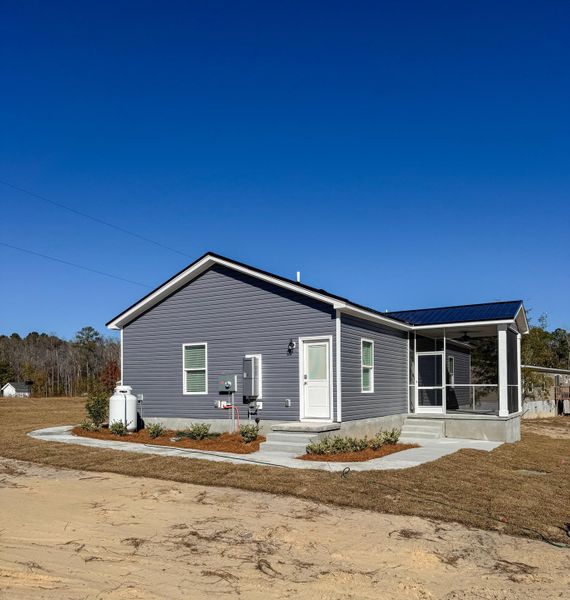 Exterior details and patio area of a home in , Walterboro (Image 3).