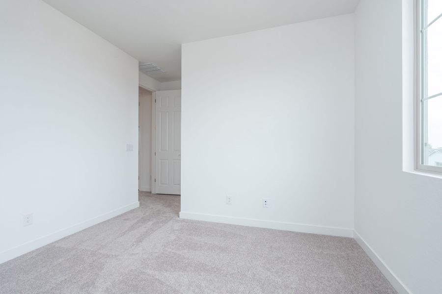 Spacious, unfurnished interior of a new home in Soleo, Queen Creek (Image 18).