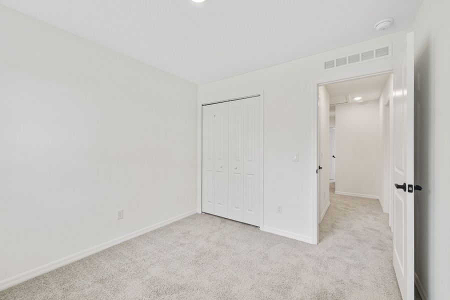 Spacious, unfurnished interior of a new home in Towns at Riverwalk, Sanford (Image 23). Spacious, unfurnished interior of a new home in Towns at Riverwalk, Sanford (Image 23).