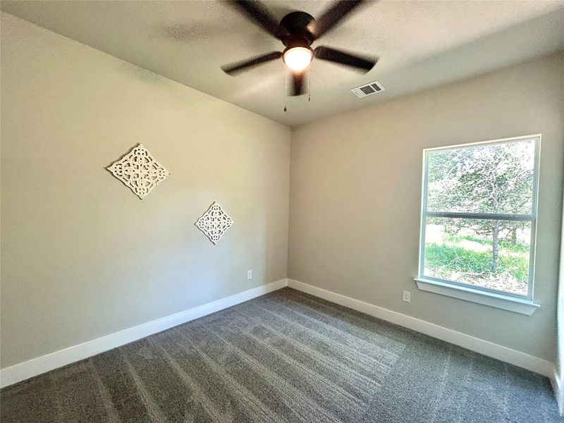 First small bedroom with walk-in closet.