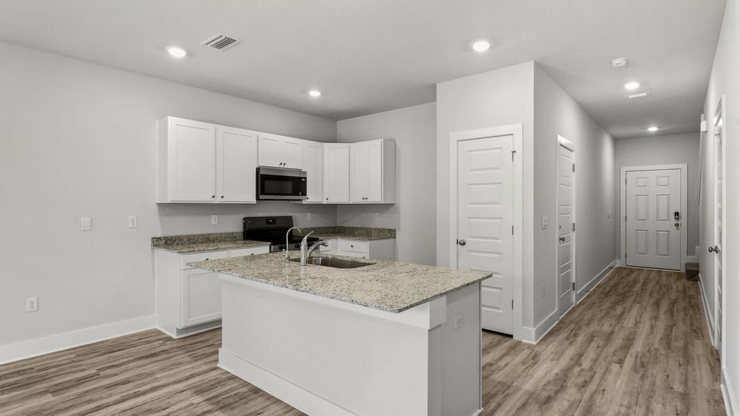 Furnished interior view inside a new home in Chateau Nemours, Port Saint Joe (Image 9).