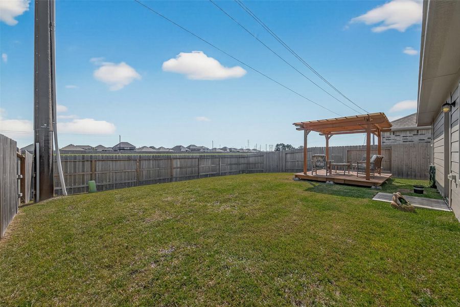 Exterior details and patio area of a home in , Baytown (Image 4).