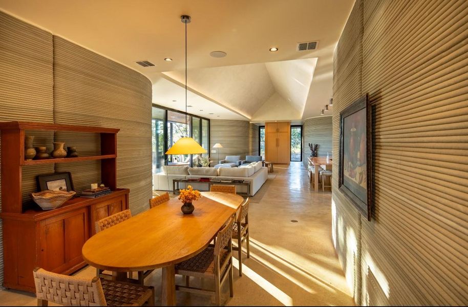 Dining space featuring concrete floors and recessed lighting