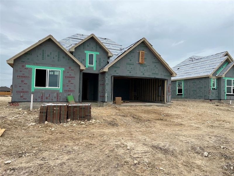Front exterior of a new home in Park Meadows, Lorena, TX, highlighting curb appeal (Image 1). Front exterior of a new home in Park Meadows, Lorena, TX, highlighting curb appeal (Image 1).