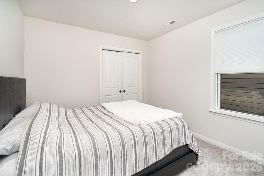 Furnished interior view inside a new home in Village at North Reach, Charlotte (Image 17).