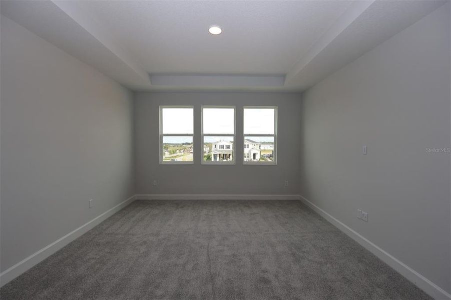 Spacious, unfurnished interior of a new home in Lake Star at Ovation, Winter Garden (Image 35).